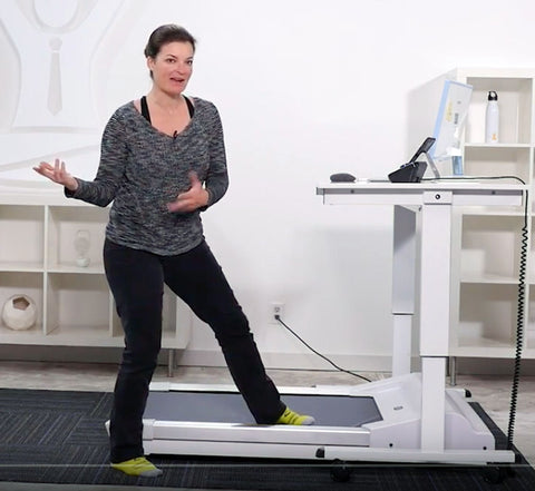 Jacki Burge of Desk Yogi demonstrating the Unsit Treadmill