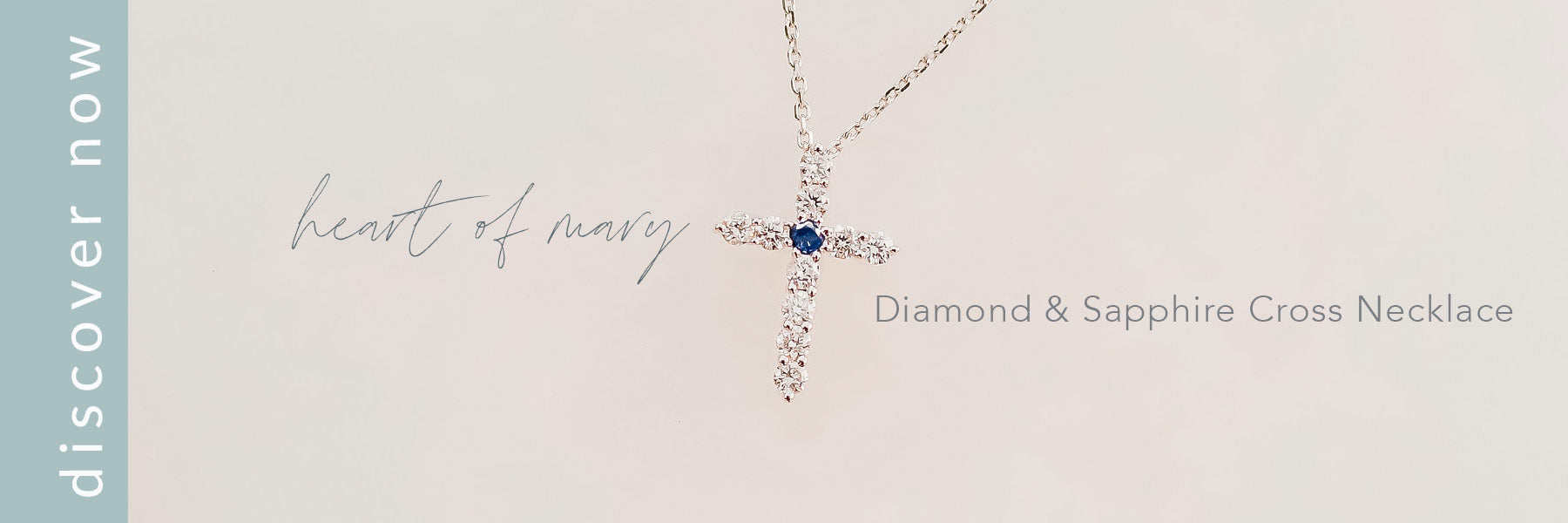 link to diamond and sapphire cross necklace in same window