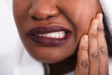 Jaw pain (royalty free image courtesy of Shutterstock)