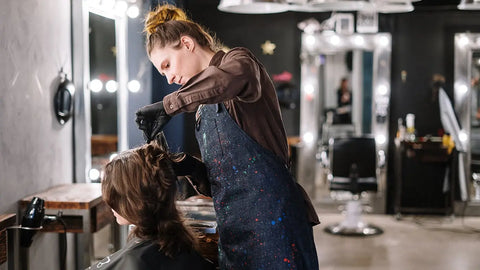 what uniform is best for hairdresser: apron covered in hair dye