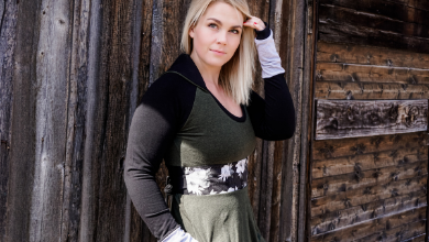 Green and Black dress with long sleeves, thumbholes and a collar