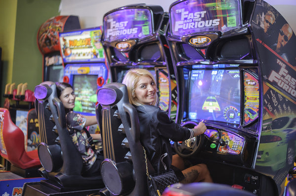 Girls at a arcade game counter