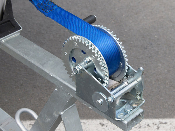 Image of a trailer with a blue rope. 