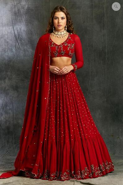 astha narang red lehenga