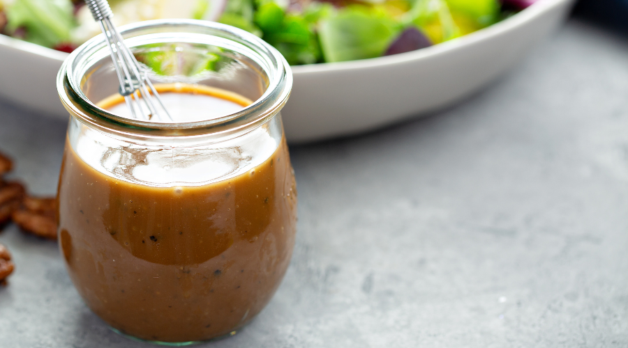 Small glass jar of balsamic vinaigrette for diabetics