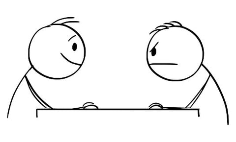 two stick figures at a table facing each other