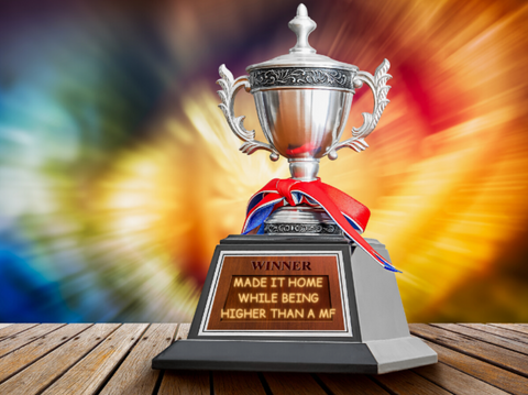 comedic image of trophy for making it home while high on cannabis