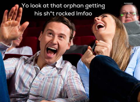 young couple laughing at movie theater