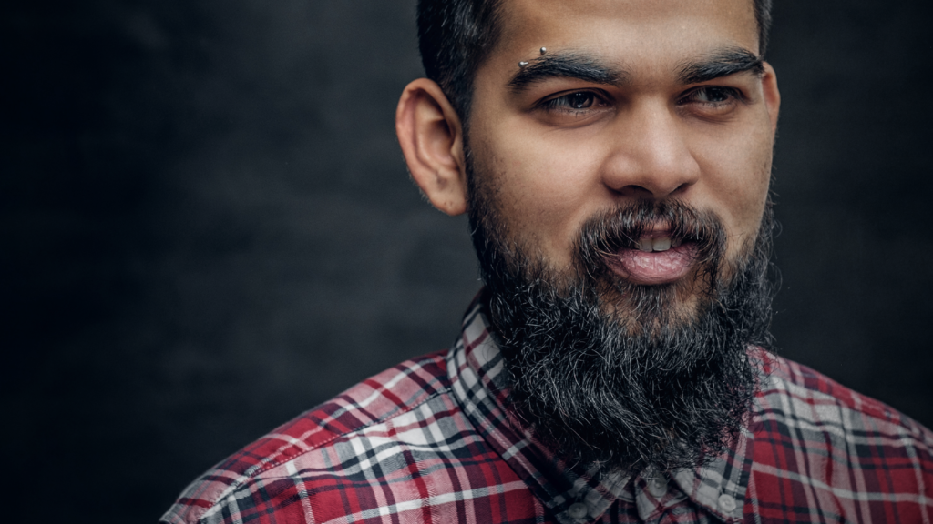 Man with beard looking afar