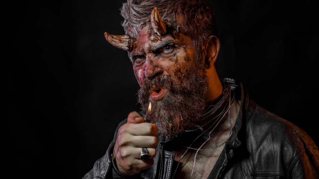 Bearded man in devil costume