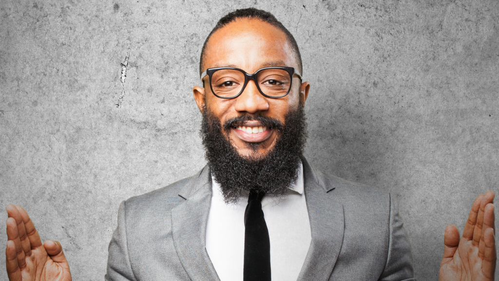 Man with beard in suit smiling