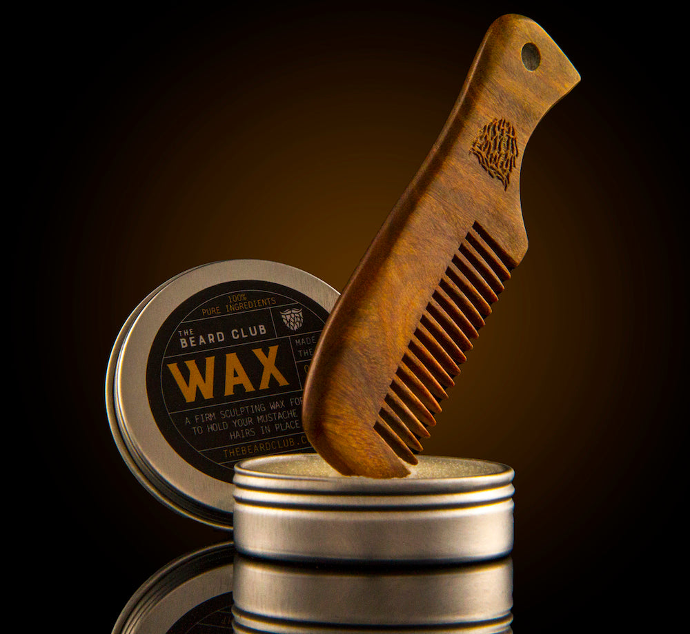 comb dipped in beard wax