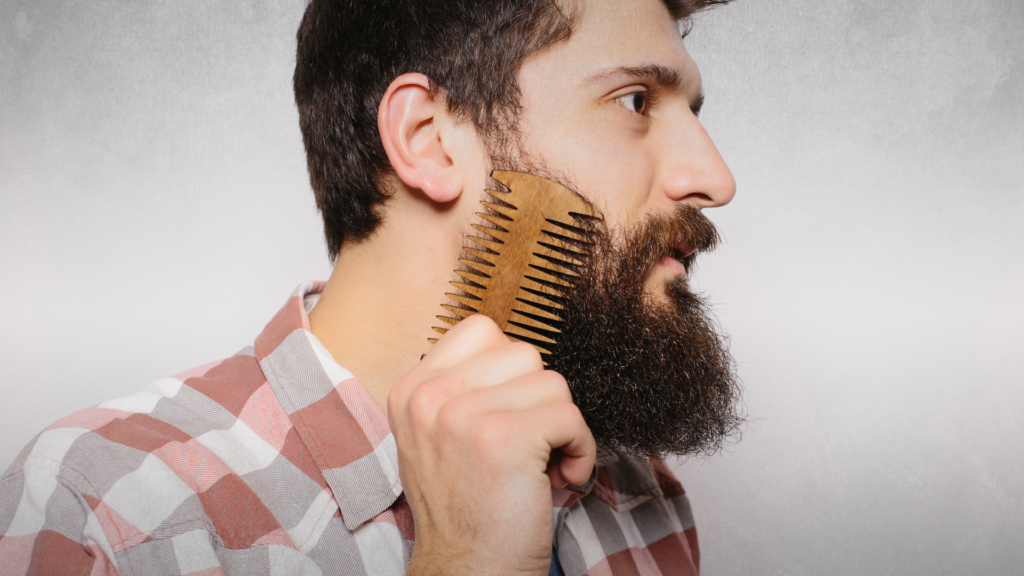 Man combing his beard