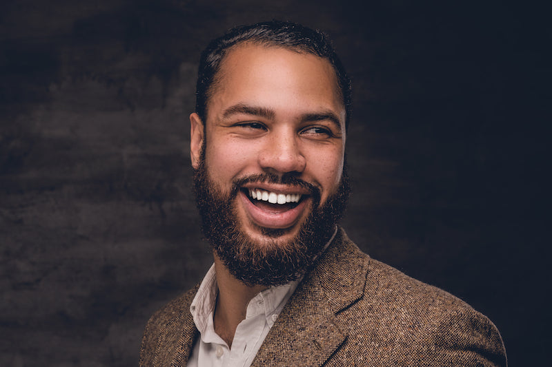 bearded man smiling