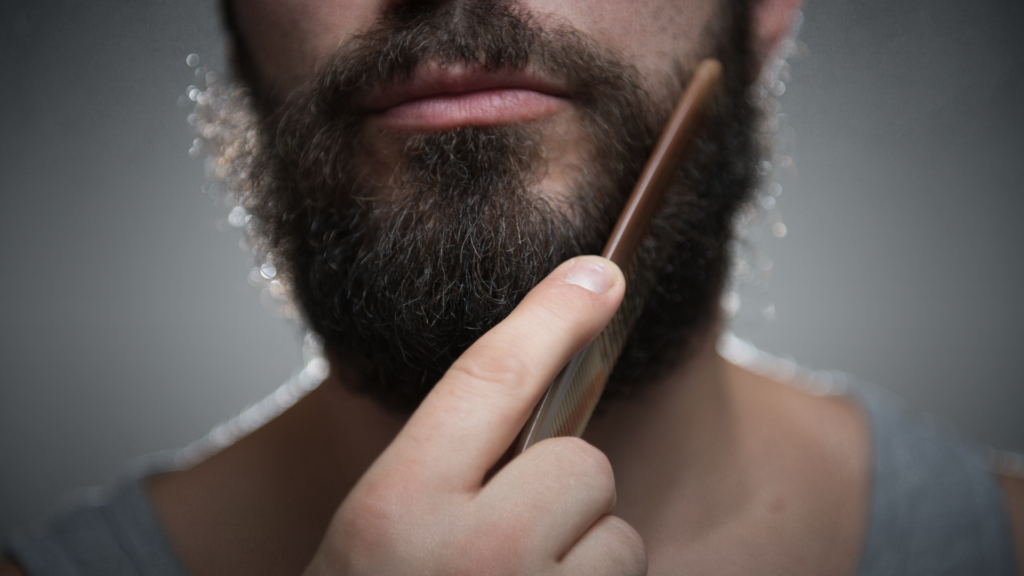 Man combing his beard