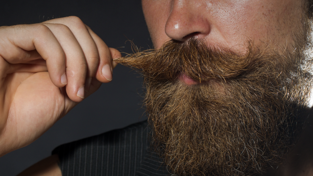 Man massaging his mustache