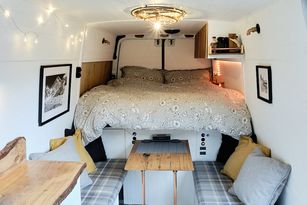 Living full time in a Mercedes sprinter campervan length ways bed layout