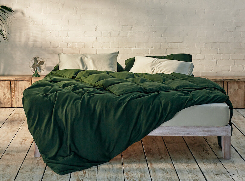 dark green bedding with clearpay