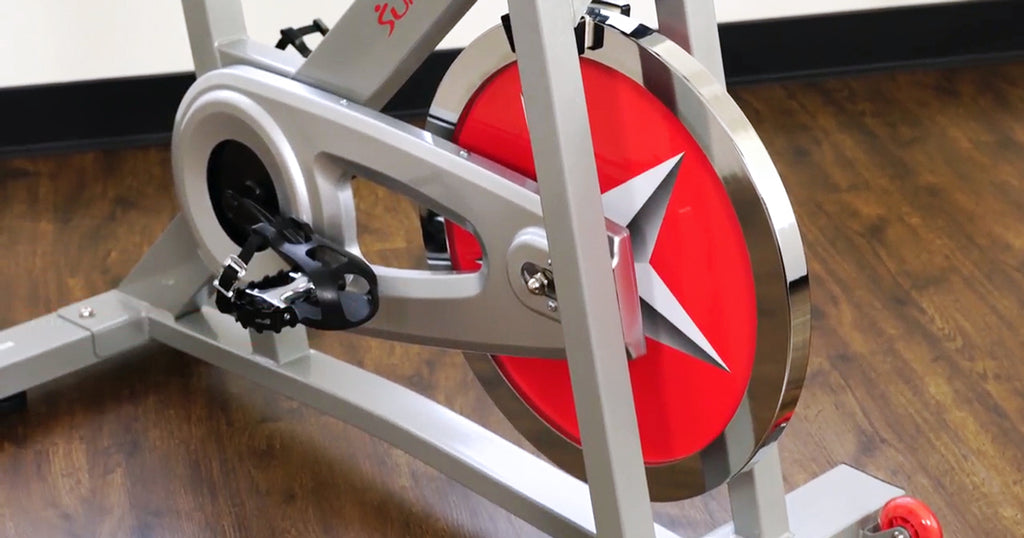 indoor cycling bike with a weighted flywheel