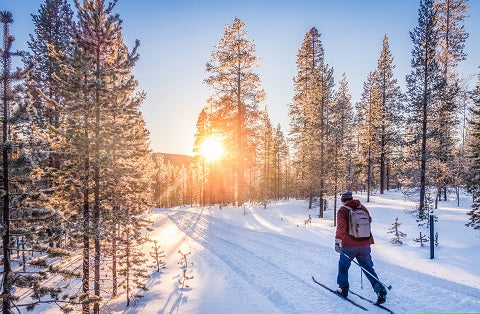 man skiing in winter