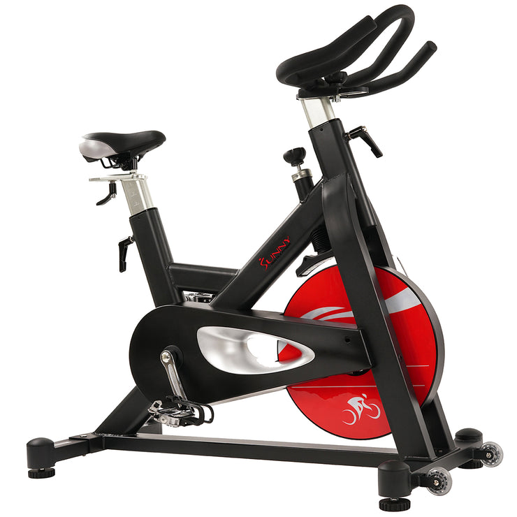 indoor cycling bike with a weighted flywheel