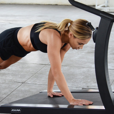 woman doing hand walkers on treadmill 