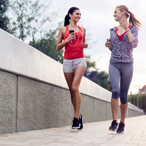 two women are jogging