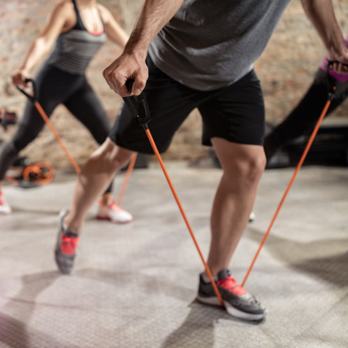 a man is using resistance band