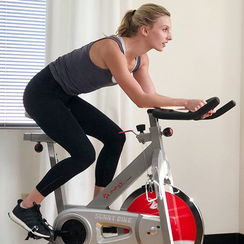 Sunny fitness trainer Sydney is cycling