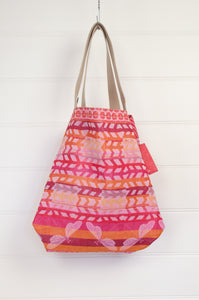 Made in France, Létol medium reversible tote bag market bag, organic cotton jaquard print in the Gaëtan design in coral pink and orange.
