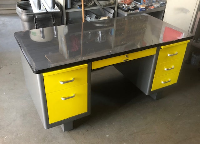 yellow metal desk