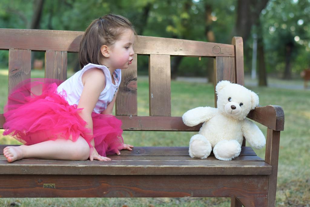 child with stuffed animal