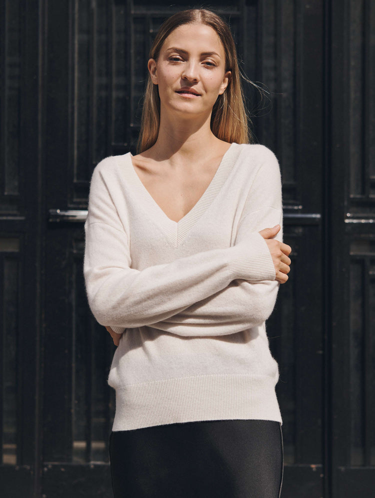 white sweater with pearls