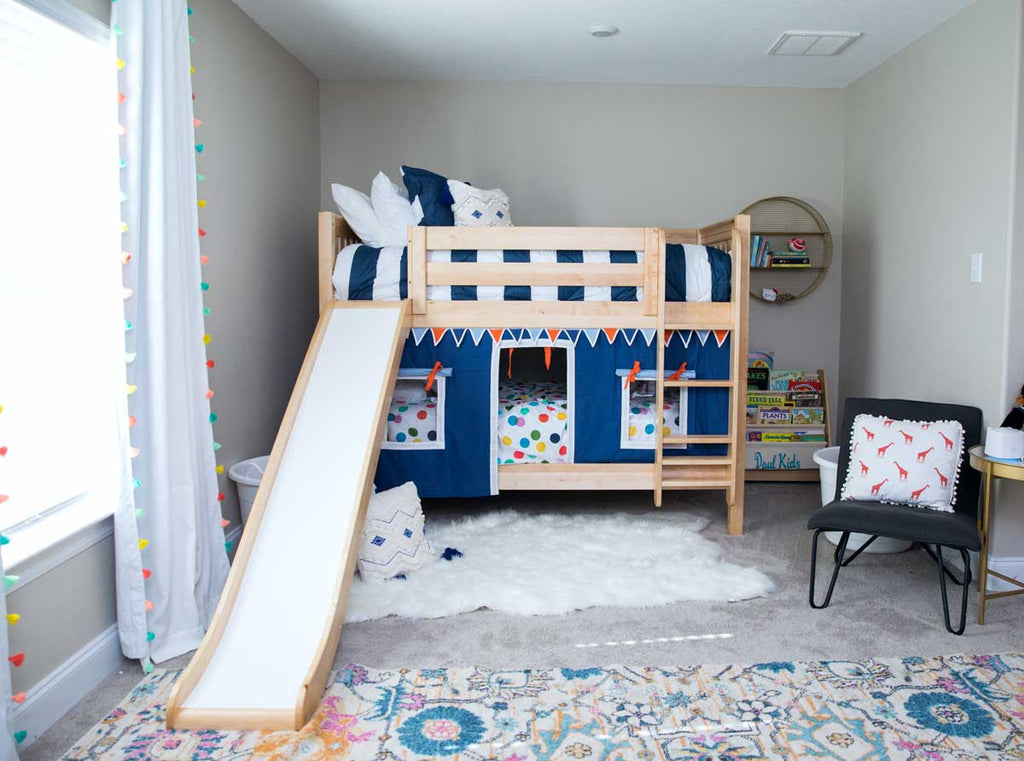 twin low bunk beds with slide and curtain