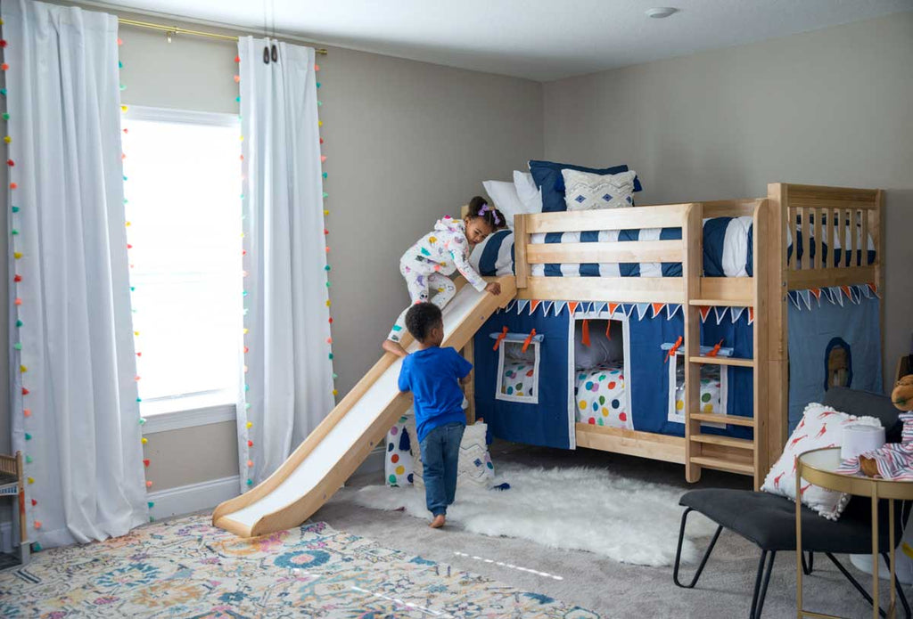 twin bunk beds with slide and curtain