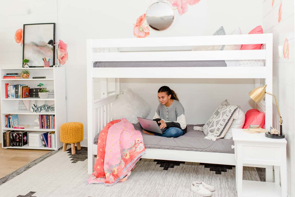 tween girls room bunk bed with ladder on end