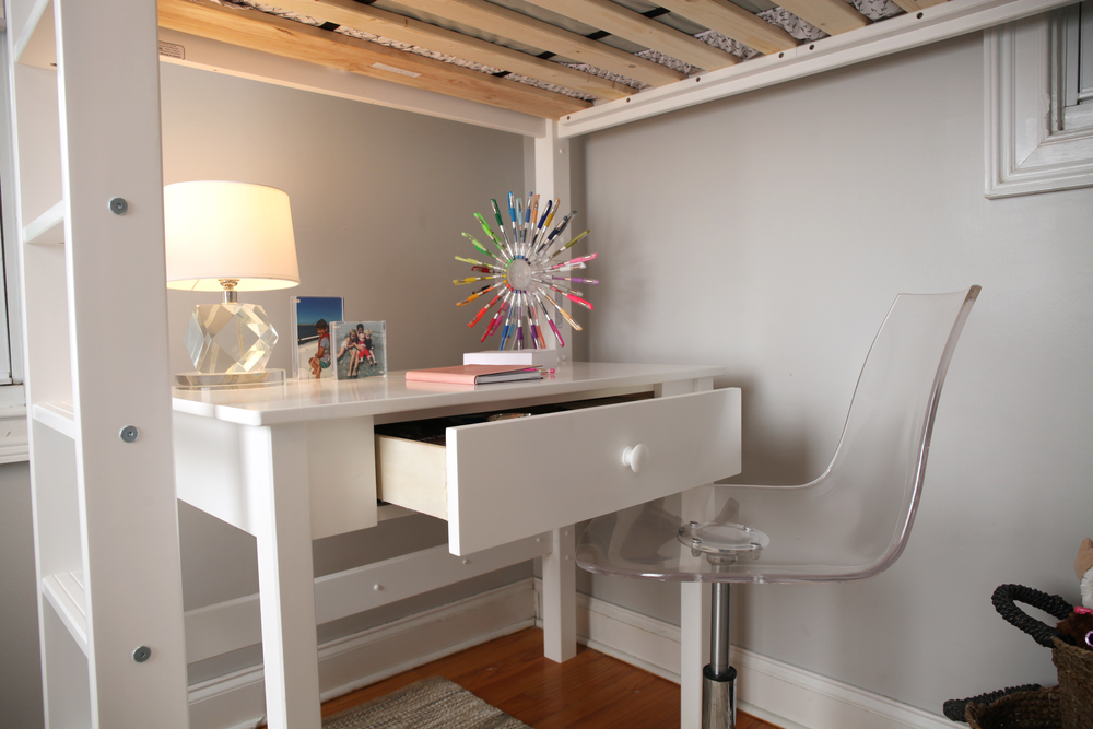 student desk under loft