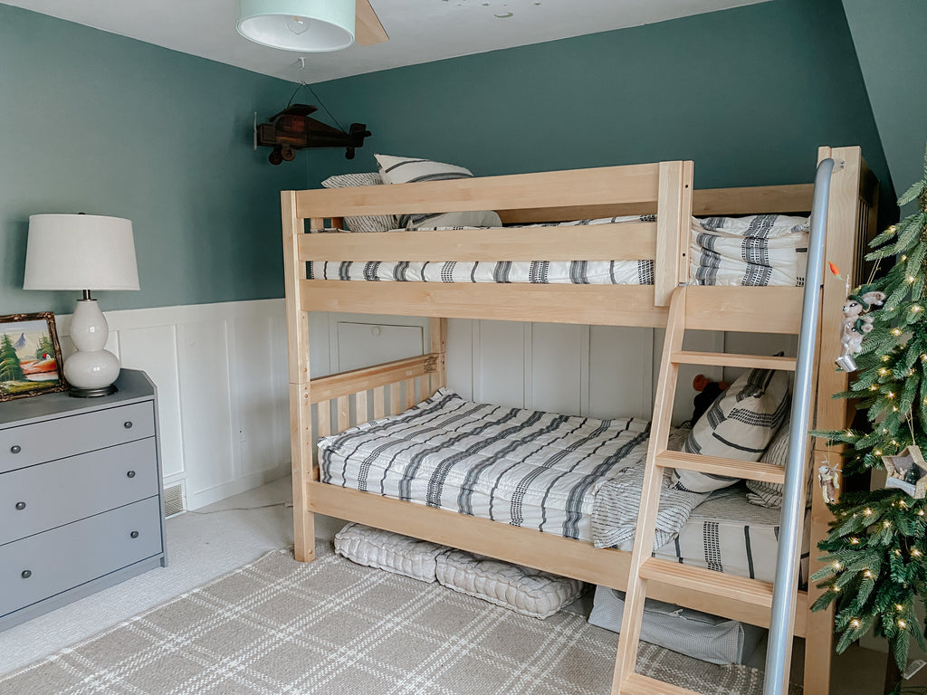 low bunk bed with angled ladder