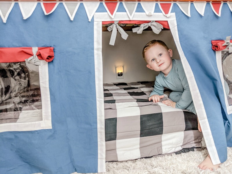 low loft bed with curtains