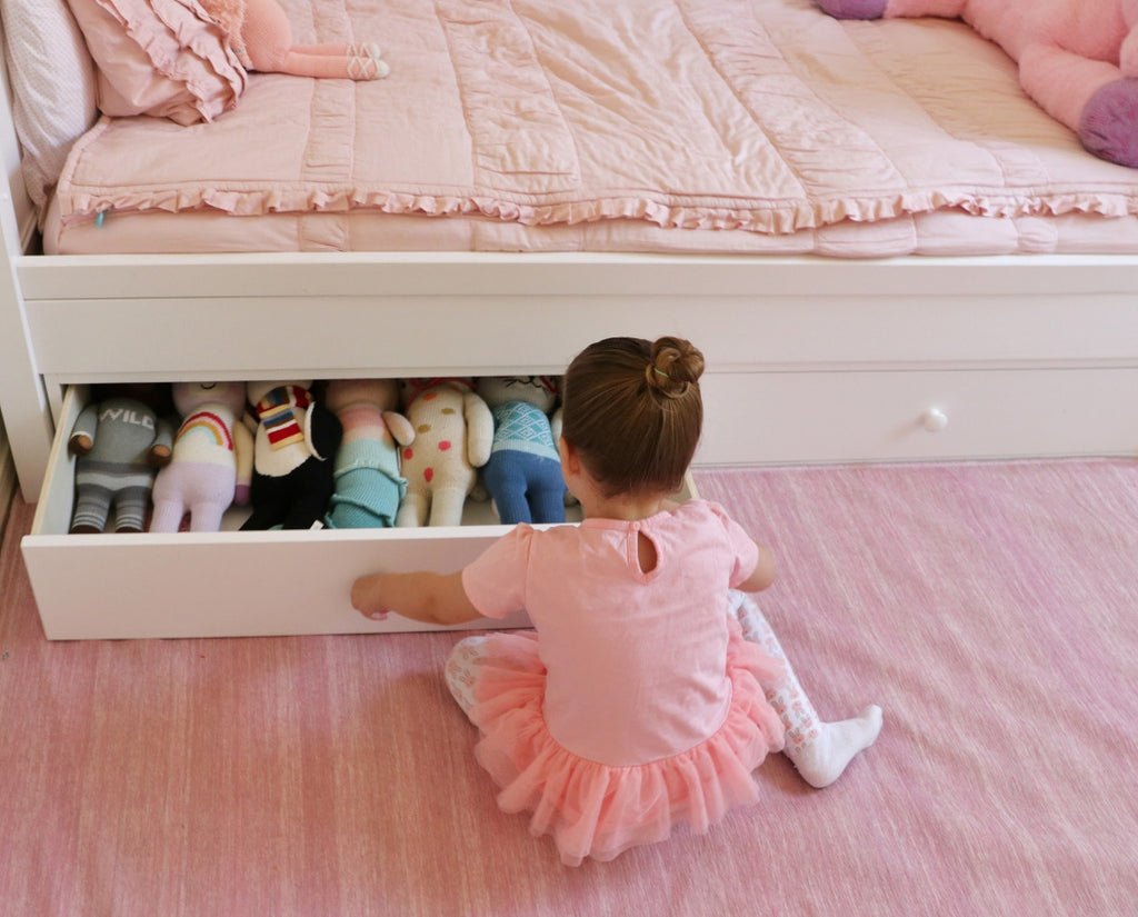 child's bed with storage underneath