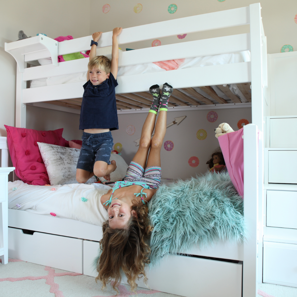 kids having fun on twin over full bunk bed