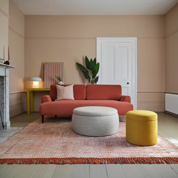 red sofa yellow ottoman pink sofa pink walls pink living room pink and yellow living room velvet sofas colourful living room ideas 