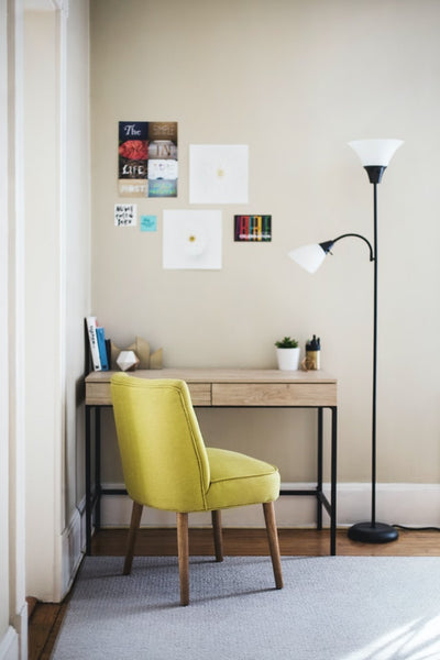 Wooden desk with yellow armchair