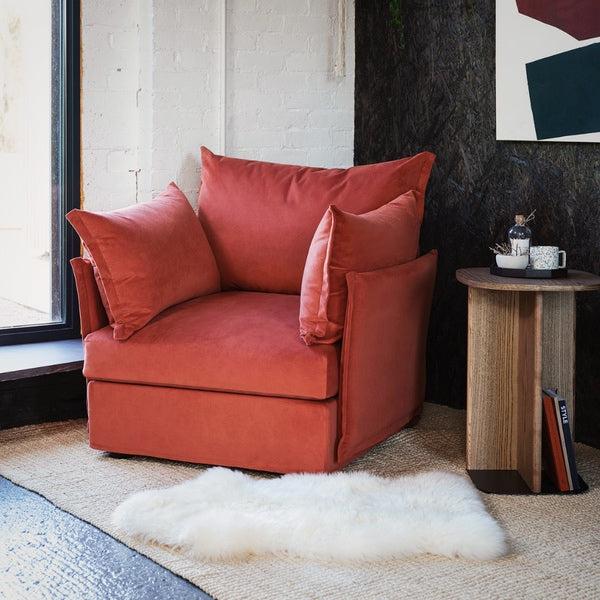 autumnal aesthetic cosy aesthetic autumn decor red sofa velvet sofa terracotta sofa brick sofa comfortable armchair