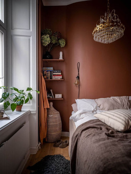bedroom with burgundy red walls