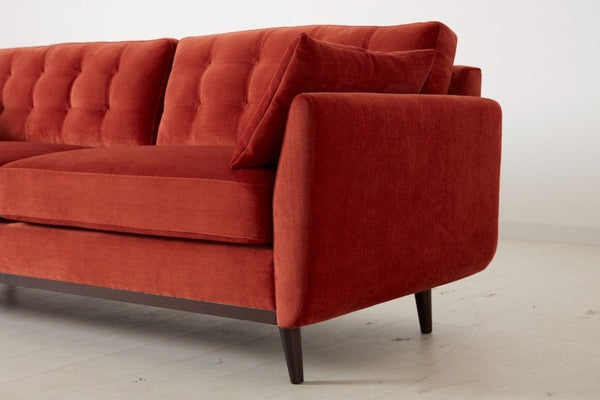 red mid century style sofa