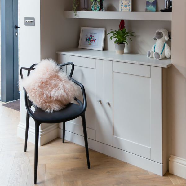 Built in cupboard and shelves in living room