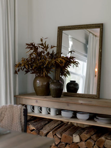 Sideboard with fire log decoration