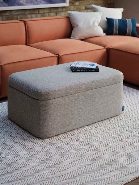 grey rug and grey ottoman