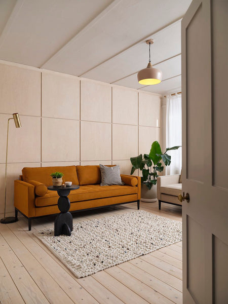 tan colour sofa in scandi living room